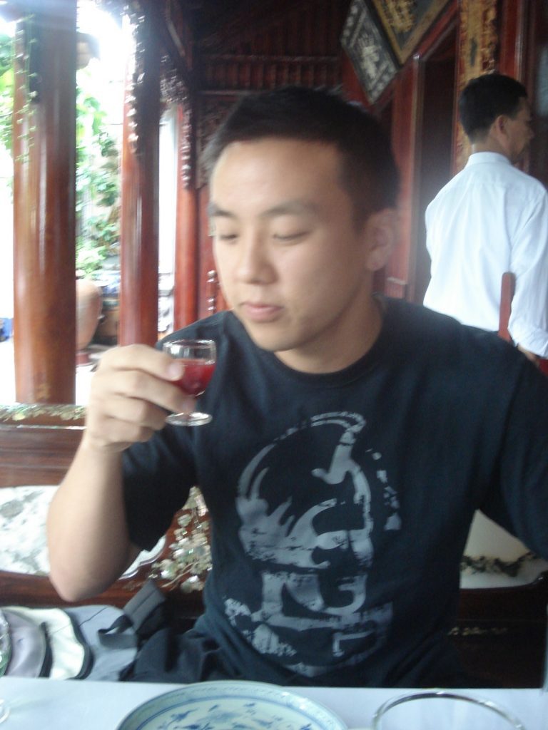 Drinking a snake heart at the Snake Village Restaurant