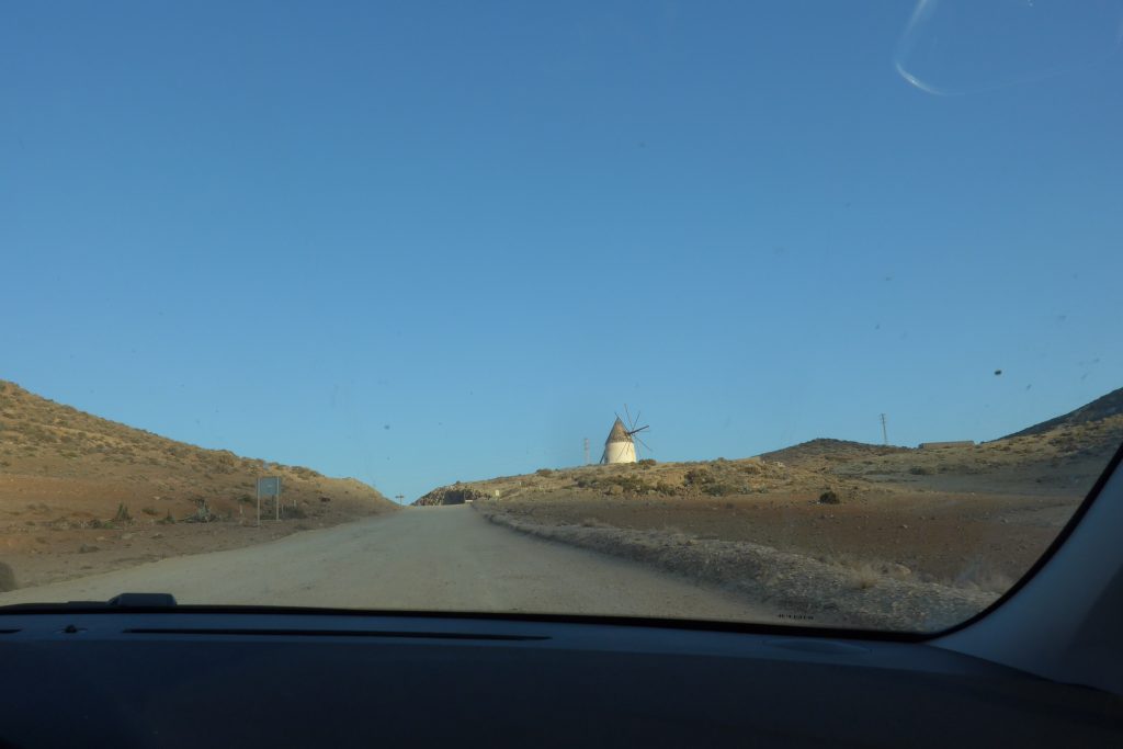 Driving past the windmills on the way to The rock that appeared in Indiana Jones movie, shot here at Playa Monsul in San Jose, Spain
