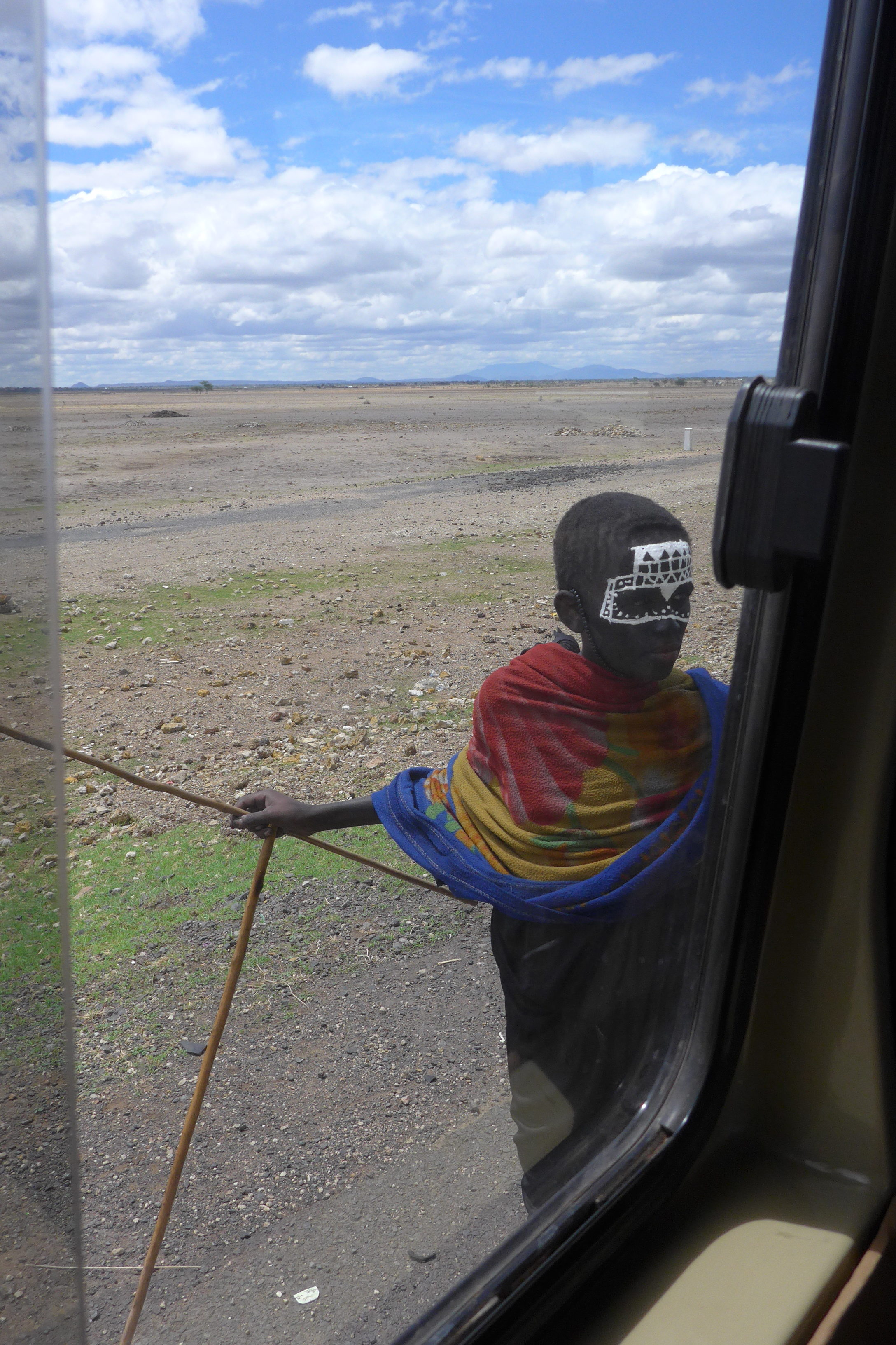 Maasai boy with painted face