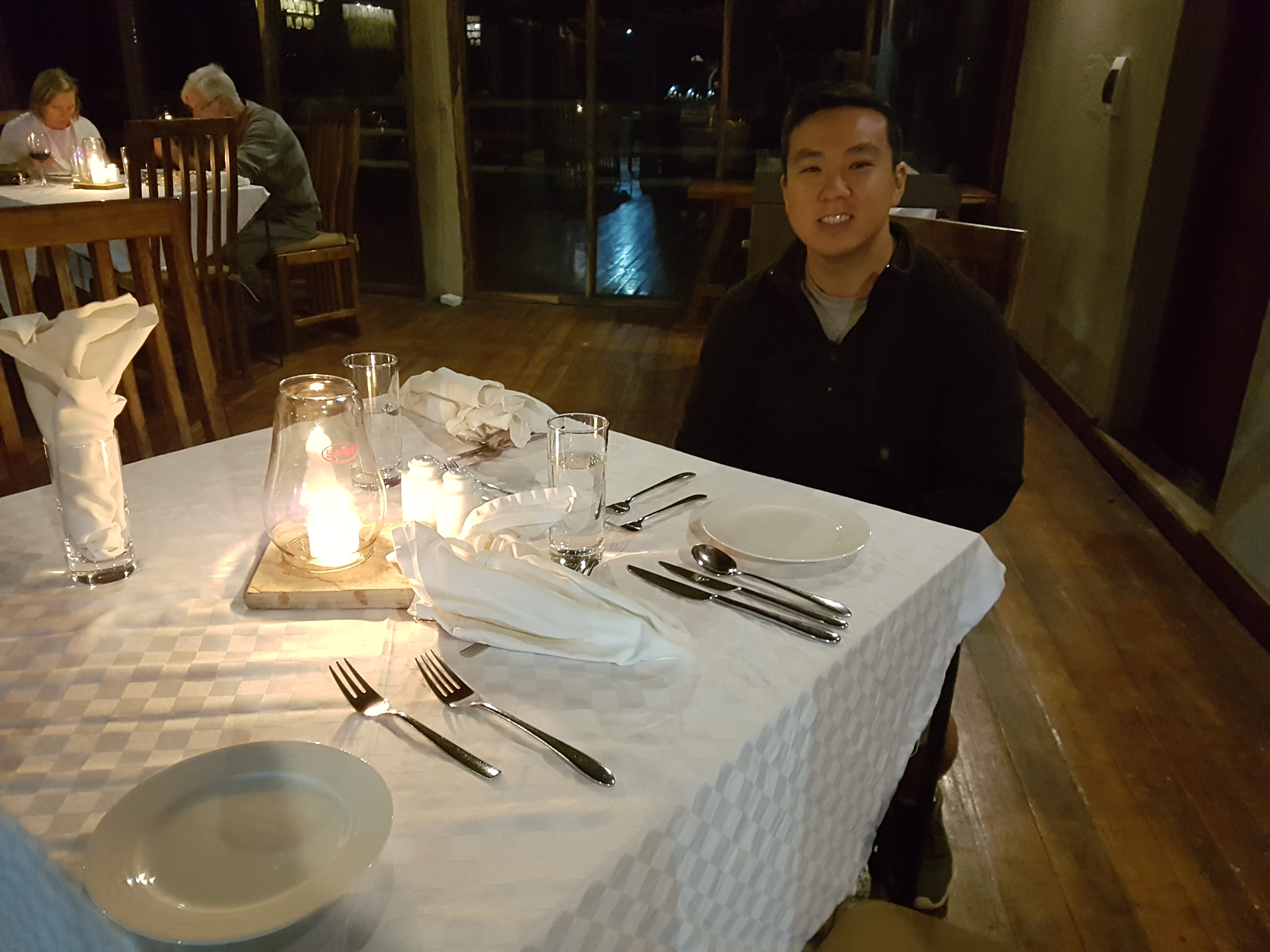Ryan having dinner at Kubu Kubu
