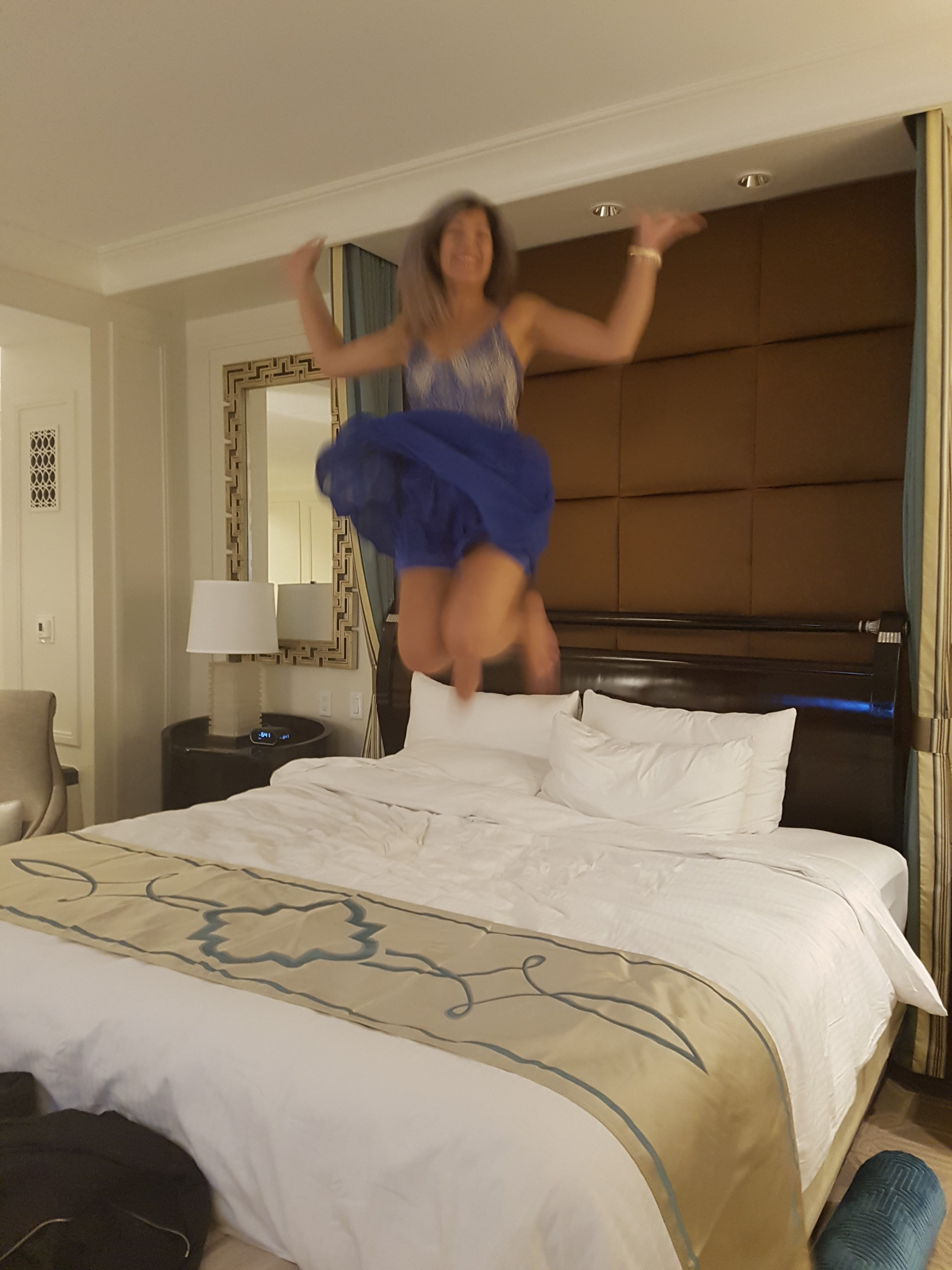 Palazzo Suite Jumping on Bed
