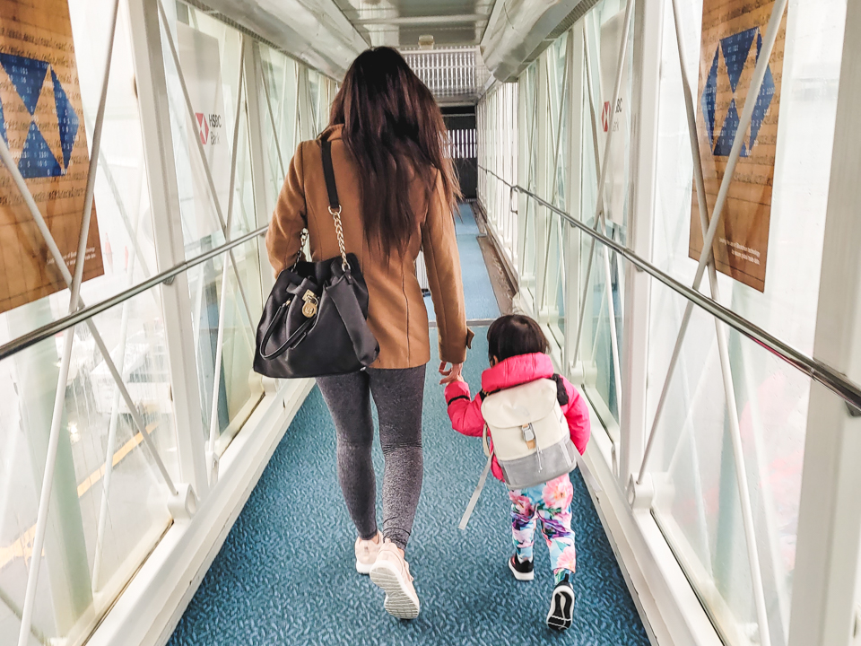 We've brought our daughter on many flights and learned a lot along the way. Here are all our tips for flying with a toddler!