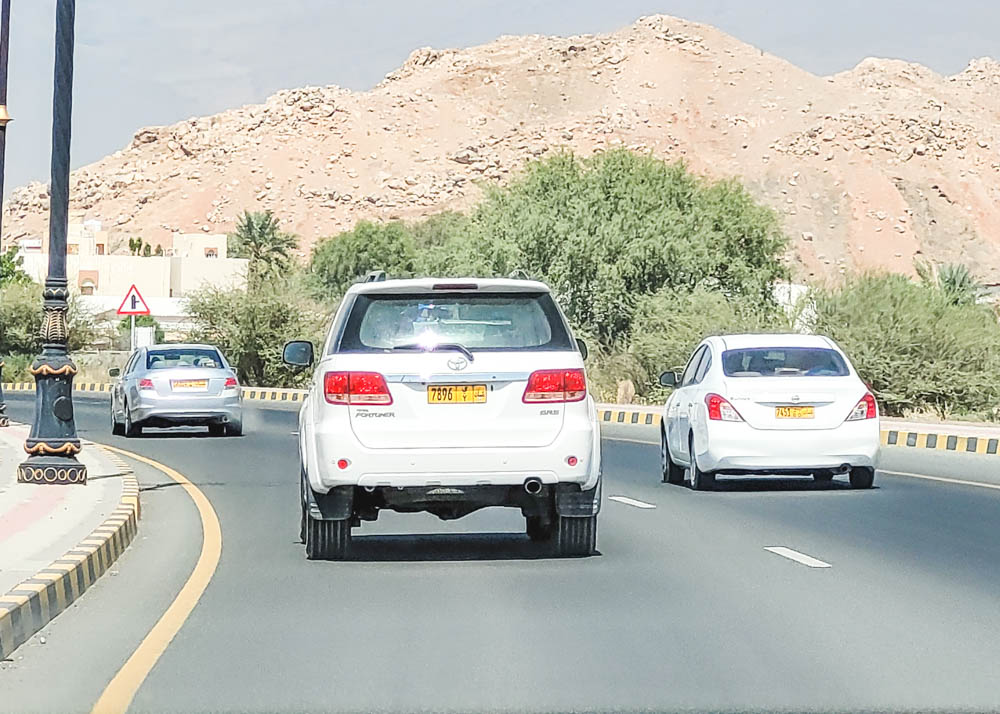 Driving in Oman Yellow License Plates