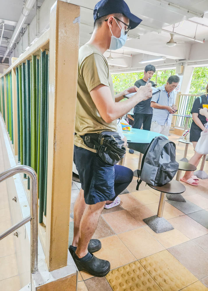 Staff taking order at Outram Park Fried Kway Teow Mee